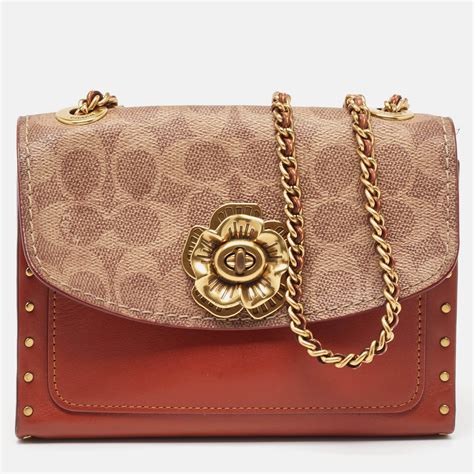 Coach Brownbeige Signature Coated Canvas And Leather Parker Crossbody Bag Coach The Luxury Closet