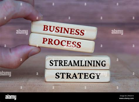 Business Process And Streamlining Strategy Text On Wooden Blocks