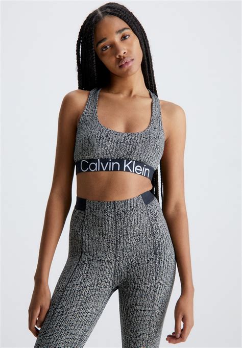 Calvin Klein Performance Wo Medium Support Sports Bra Shocking Print Black Zalando Ie