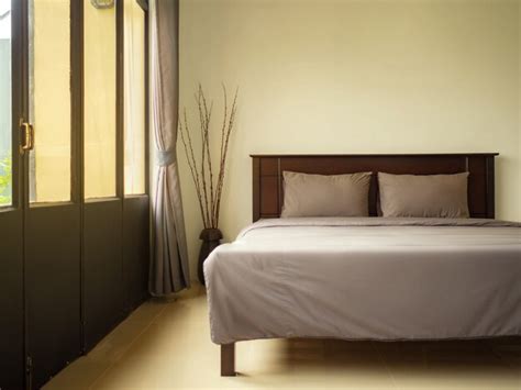 Premium Photo Empty Bed In Luxury And Natural Bedroom