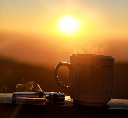 Morning Cup Of Coffee With Mountain Background At Sunrise Silhouettes