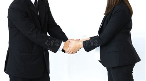 Handshake Of Business Man And Woman In Strategic Relationships Stock