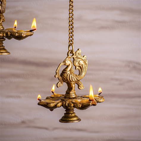 Buy Handcrafted Brass Peacock Hanging Diya Online in India - karvachauth