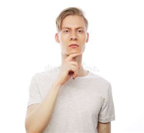 Portrait Of The Young Thinking Man With Hand Near Face Stock Image