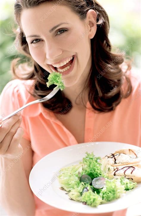 Woman Eating A Salad Stock Image F001 2476 Science Photo Library