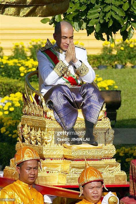 Cambodias King Norodom Sihamoni Is Carried To His Throne During His