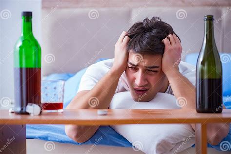 The Man Alcoholic Drinking In Bed Going Through Break Up Depression