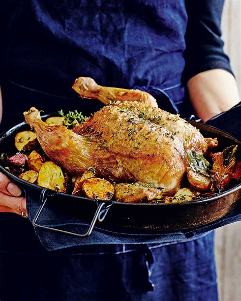 Roast Chicken With Lemon Garlic And Thyme Delicious Magazine