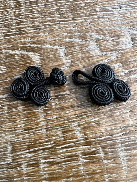 2 Sets Of Frog Fasteners Black And Ivory Satin Effect Frog Fasteners