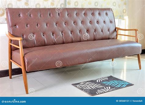 Retro leather sofa in room stock image. Image of vintage - 38568131