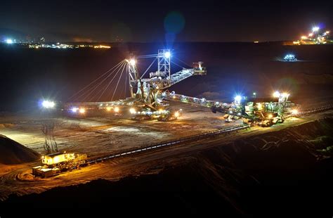 open pit mining night bucket wheel  photo  pixabay