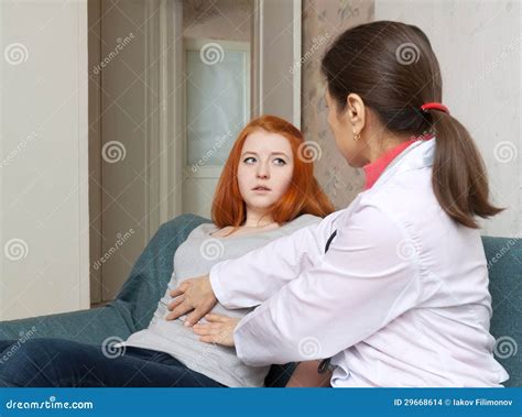Mature Doctor Touches Belly Of Teenager Stock Photo Image Of Ache Patient