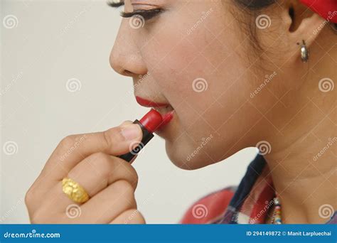 A Portrait Pretty Asian Woman Use Red Lipstick On Lips With Make Up Her