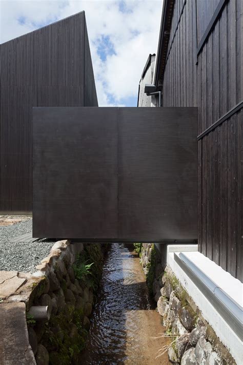 A Steel Cuboid Structure Has Been Inserted Into This Former Rice Mill In Japan To Create A