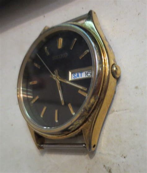 Vintage Seiko 7n43 8a99 Black Dial Day Date Quartz Watch Goldtone Ebay