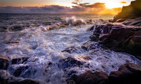 Ocean Waves Crashing on Rocks during Sunset · Free Stock Photo