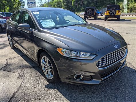 Pre Owned 2016 Ford Fusion Titanium Hybrid In Magnetic Greensburg H07774x