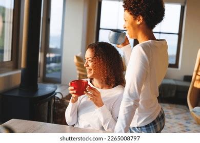 Happy Diverse Lesbian Couple Drinking Coffee Stock Photo 2265008797