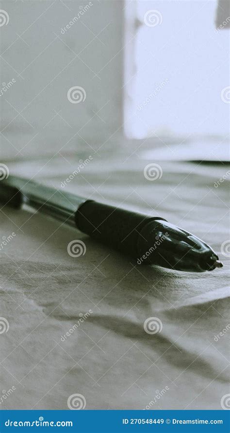 A Black Pen on a Sheet of Paper in a Classroom Stock Image - Image of ...