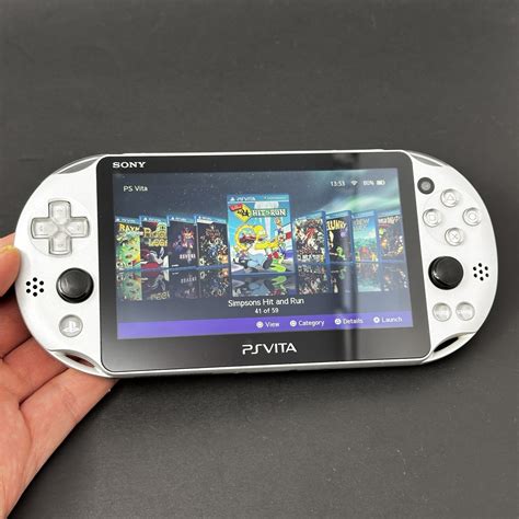 PS Vita Slim (128GB) – 580 Games | Ice Silver – Samtendo