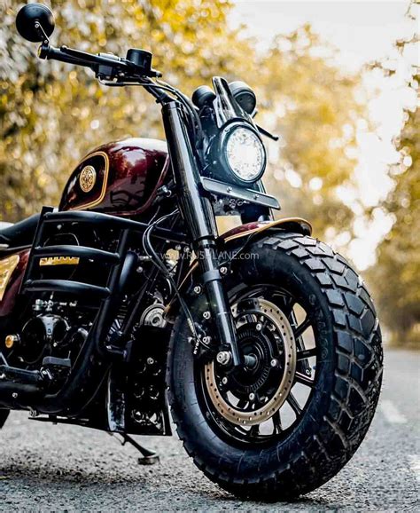 modified royal enfield meteor   gold colour highlights
