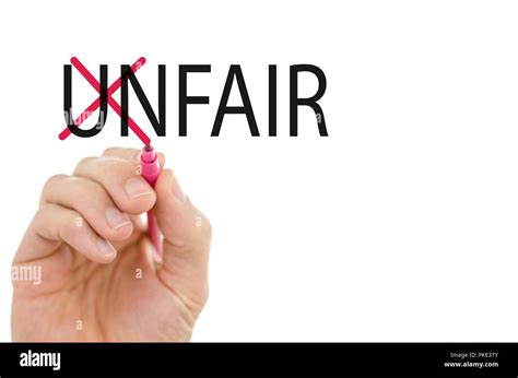 Changing word Unfair into Fair by crossing off letters un Stock Photo ...