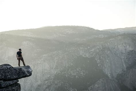 Hd Wallpaper Person Standing Near Rock Cliff Person Standing On