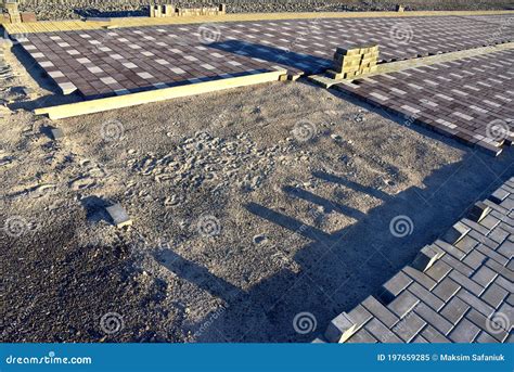 Process Of Installing Paving Bricks In The Town Pedestrian Zone Laying