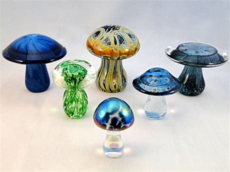 There Are Many Glass Mushrooms On The Table