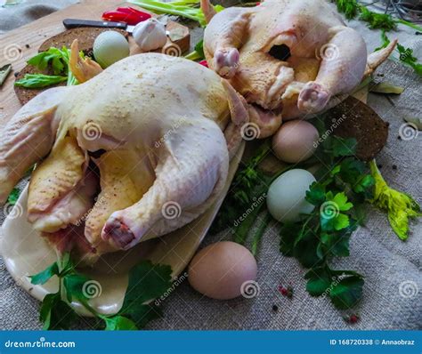 Fresh Rawrustic Organic Chickens Prepared For Baking In The Oven