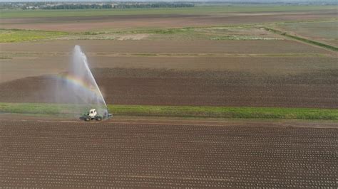 Premium Photo | Aerial view of crop irrigation using the center pivot sprinkler system an ...