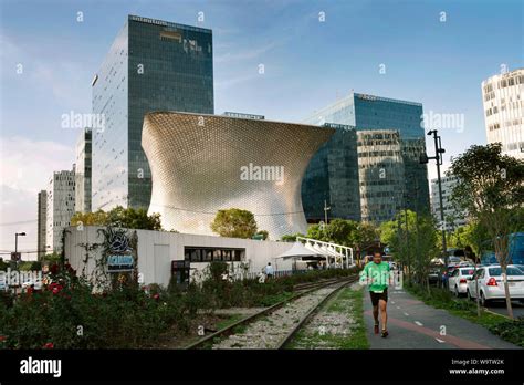 Man Jogging Taking A Break From The Office In Polanco District