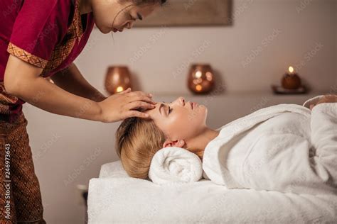 Awesome Attractive Woman Enjoying Massage In The Spa Center Body Care