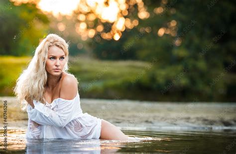 Sexy Blonde Woman Play In Lingerie In A River Water Stock Photo Adobe Stock