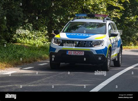 Romanian Police New Dacia Duster Car In Motion On Asphalt Road Front