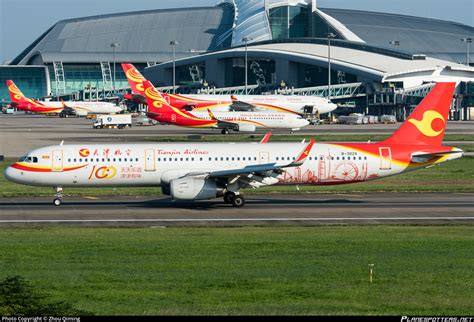 B 302X Tianjin Airlines Airbus A321 231 WL Photo By Zhou Qiming ID