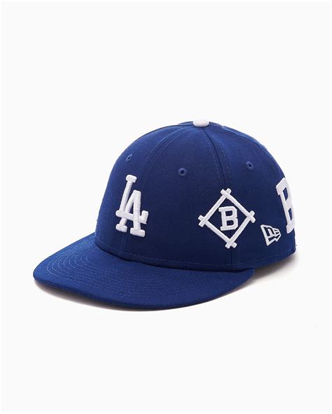 New Era La Dodgers Mlb All Over Logo Fifty Unisex Cap Blauw