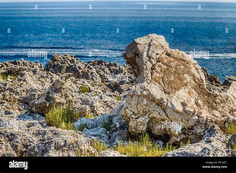 The Blue Sea And The Wild Rocky Coast Of Salento Near Otranto In