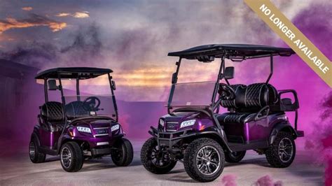 Two Purple Golf Carts With The Words Twilight On Them