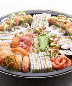 An Assortment Of Sushi On A Platter