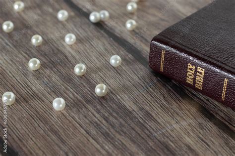 Pearls Of Great Price And Holy Bible On Wooden Table The Parable Of A