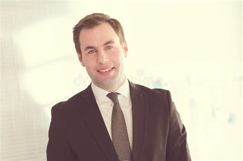 Portrait Of A Confident Mature Businessman Standing Outside Stock