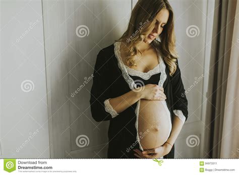 Pregnant Woman Wearing Lingerie And Posing In The Room Stock Image Image Of Sensual Elegant