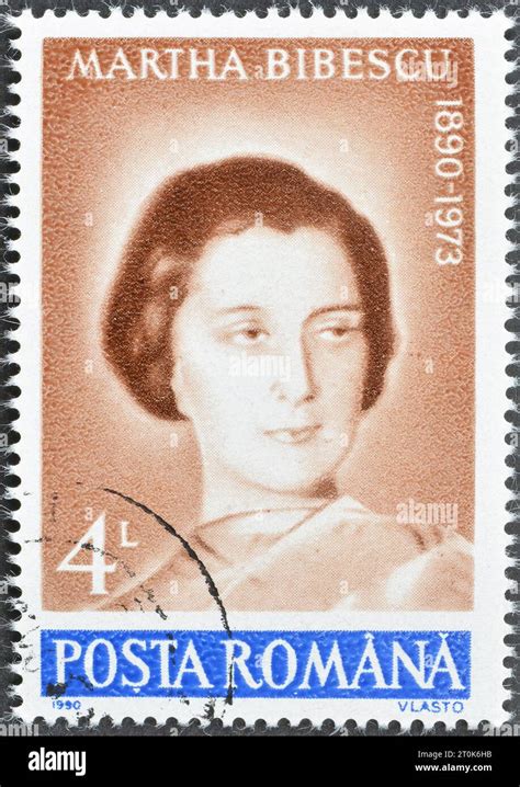 Cancelled Postage Stamp Printed By Romania That Shows Portrait Of Poet