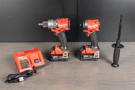 Milwaukee M18 FUEL Hammer Drill and Impact Driver Combo with Two XC 5.0 ...