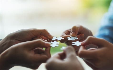 Premium Photo Closeup Image Of A Group Of People Holding And Putting