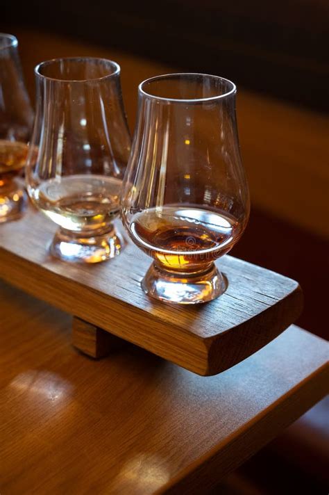 Flight Of Single Malt Scotch Whisky In Glasses Served In Whiskey Bar In Edinburgh Uk Stock