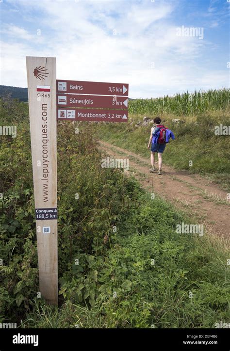 Pilgrim Passing Waymarker Sign Post On The Gr Walking Route The Way