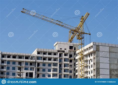 Construction Crane And High Rise Building Under Construction Stock