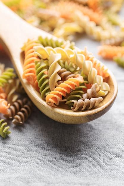 Premium Photo A Variety Of Fusilli Pasta Made From Different Types Of